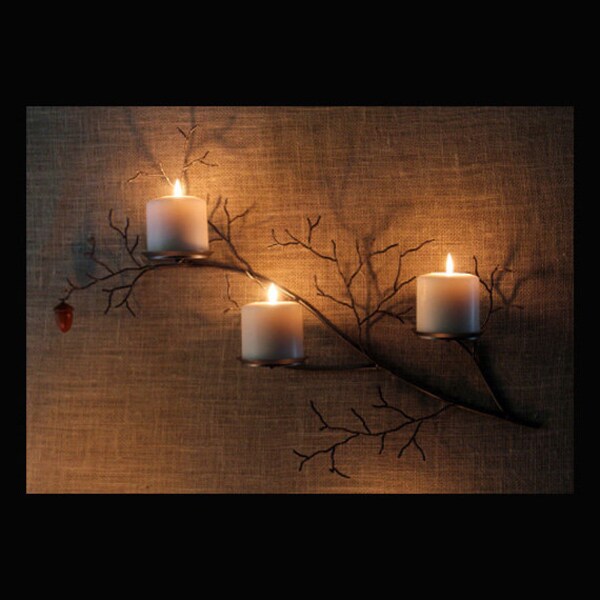 left hand metal  tree branch sculpture wall sconce with hand turned acorn for votive and pillar candles