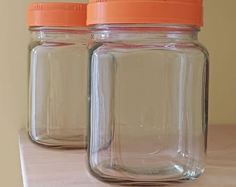 Vintage 1950s Glass Storage Jars with orange bakelite lids, british made mid century quality.