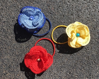 Cheerful little crochet lace hair bobbins