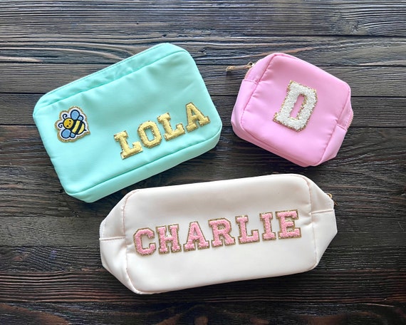 Custom top travel pouch