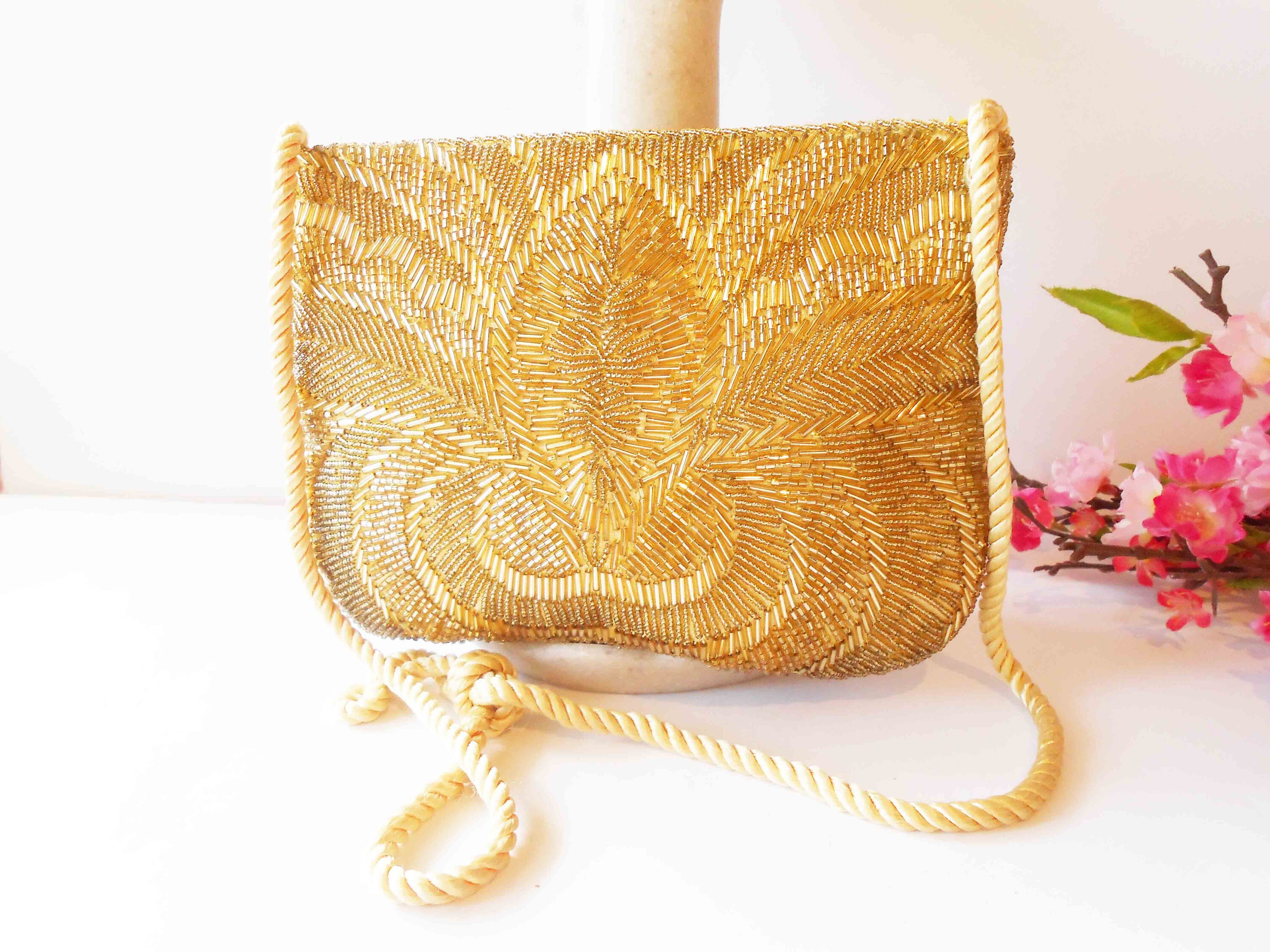WHITE HAND-BEADED CLUTCH PURSE WITH GOLD TONED ACCENTS