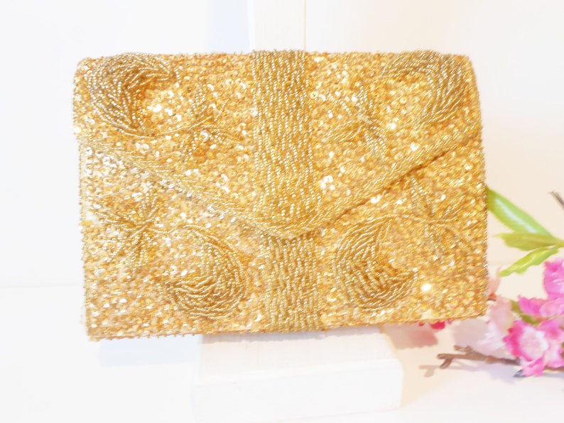 gold beaded clutch bag