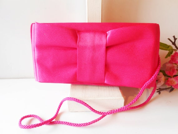bright pink clutch bag