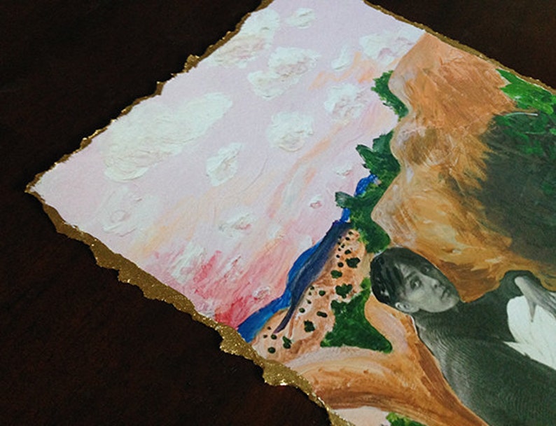 May include: A mixed media painting on paper with a pink and orange sky, white clouds, and a green and brown landscape. A black and white photograph of a person is partially visible in the lower right corner.
