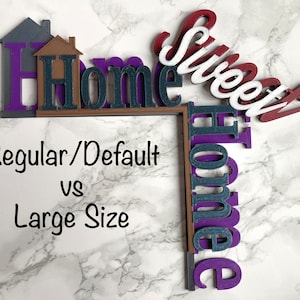 May include: A comparison of two sizes of "Home Sweet Home" wooden signs. The smaller sign is labeled "Regular/Default" and the larger sign is labeled "Large Size".
