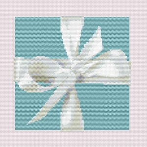 May include: A white satin ribbon tied in a bow on a light blue background. The bow is tied in a knot in the center of the image.