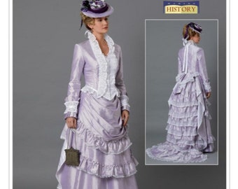 May include: A lavender historical dress pattern by Butterick. The dress features a fitted jacket with white lace trim, a ruffled skirt, and a matching hat. The pattern includes a second view of the dress. The text "Making History" is also visible.