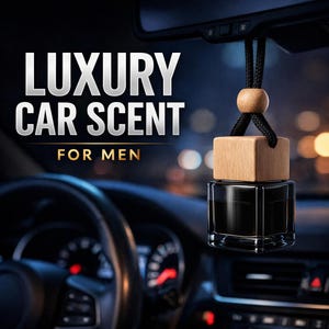 May include: A black car air freshener with a wooden top and a black cord, hanging from a car's rearview mirror. The text "LUXURY CAR SCENT FOR MEN" is displayed in silver and gold lettering.