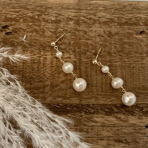 Graduated pearl earrings best sale