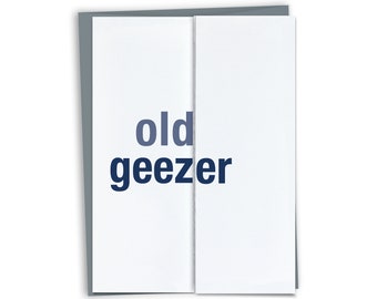 May include: A white card with the text "old geezer" printed in dark blue.