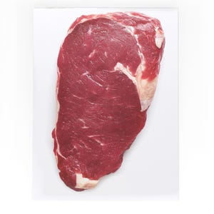 May include: A raw, red beef steak with visible marbling. The steak is on a white surface.