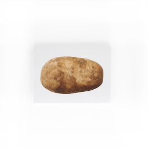 May include: A single brown potato with a rough texture.