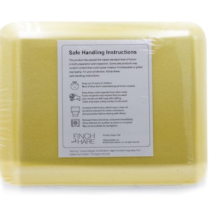 May include: Yellow foam packaging with a label that reads "Safe Handling Instructions". The label includes instructions for handling joke products, such as keeping them out of reach of children and washing your hands after handling them. The label also includes the company logo, "Finch and Hare".