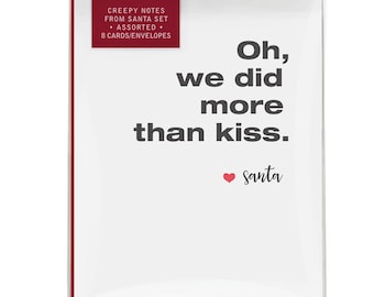 May include: A set of 8 greeting cards and envelopes in a clear plastic sleeve. The top features a dark red label with white text reading "CREEPY NOTES FROM SANTA SET • ASSORTED • 8 CARDS/ENVELOPES". The card has the text "Oh, we did more than kiss. ♥ santa".
