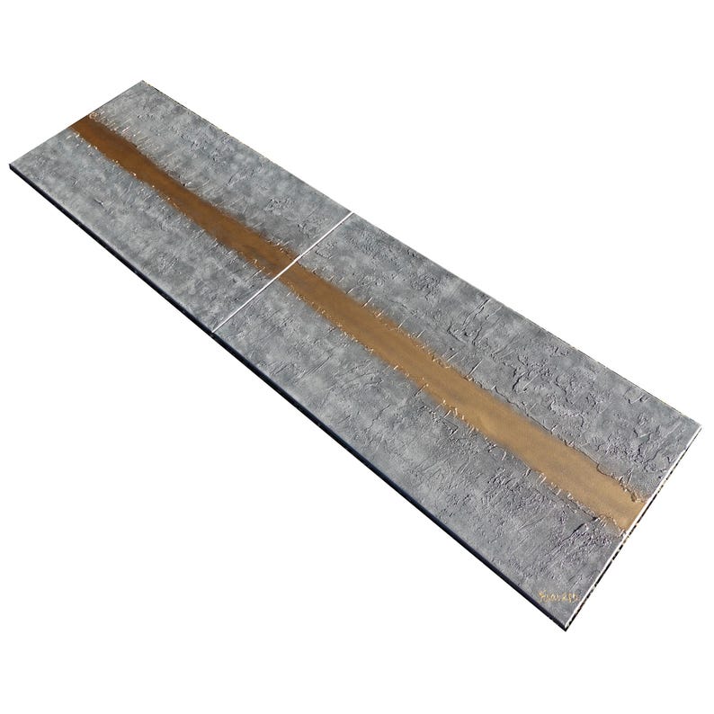 a long, rectangular surface with a horizontal line running through it, creating a sense of movement or direction.