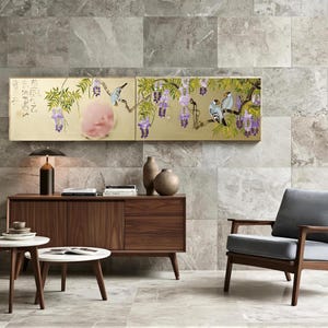 a modern living room with a large window, a wooden sideboard, a gray armchair, a wooden coffee table, and a potted plant.