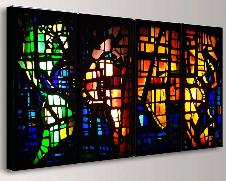 The image is a vibrant display of stained glass windows, each with a unique pattern and color scheme. The windows are arranged in a row, creating a visually striking and intricate composition.