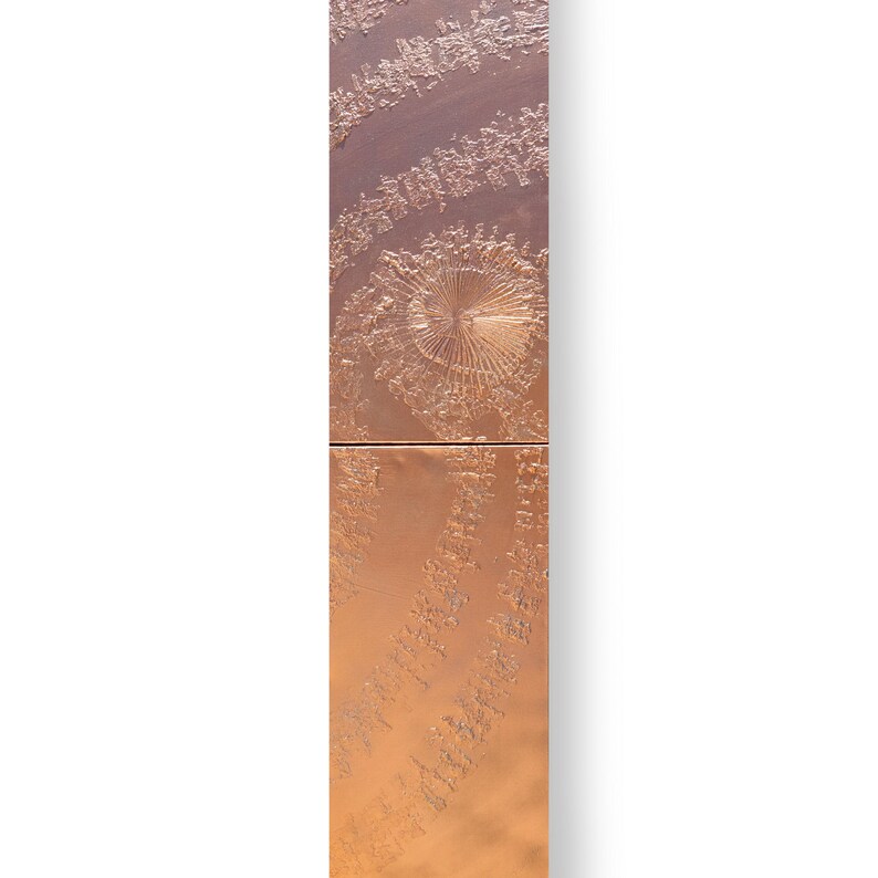 The image is a vertical panel with a textured surface, featuring a spiral pattern and a central circular design.