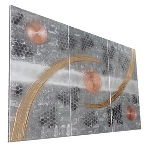 The image is a large, abstract artwork composed of various shapes and textures, including circles, lines, and other geometric forms. The artwork is displayed on a white background, which highlights the colors and patterns within the piece.