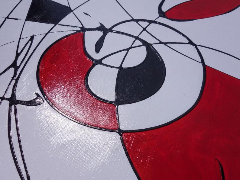 The image is an abstract painting with bold red and black colors, featuring a mix of geometric shapes and lines.