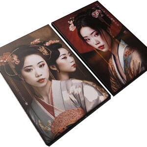 two framed prints featuring portraits of women in traditional Japanese attire, with floral headpieces. The prints are arranged side by side, creating a visually appealing composition.