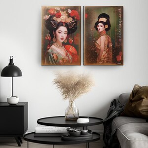 two framed artworks of women with traditional Asian hairstyles and attire, hanging on a wall above a black coffee table in a living room setting.