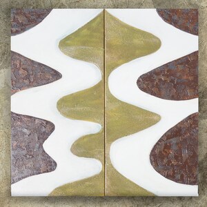 The image is a square artwork with a striking contrast between white and brown elements. The white background is adorned with a series of brown shapes, creating a visually captivating design. The composition is balanced and harmonious, with the white shapes providing a clean and crisp contrast to the brown shapes. The artwork is a captivating display of color and form, showcasing the artist's skill and creativity.