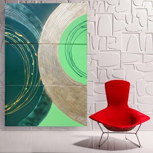 a modern, minimalist interior design with a large abstract painting on the wall and a red chair in the foreground.