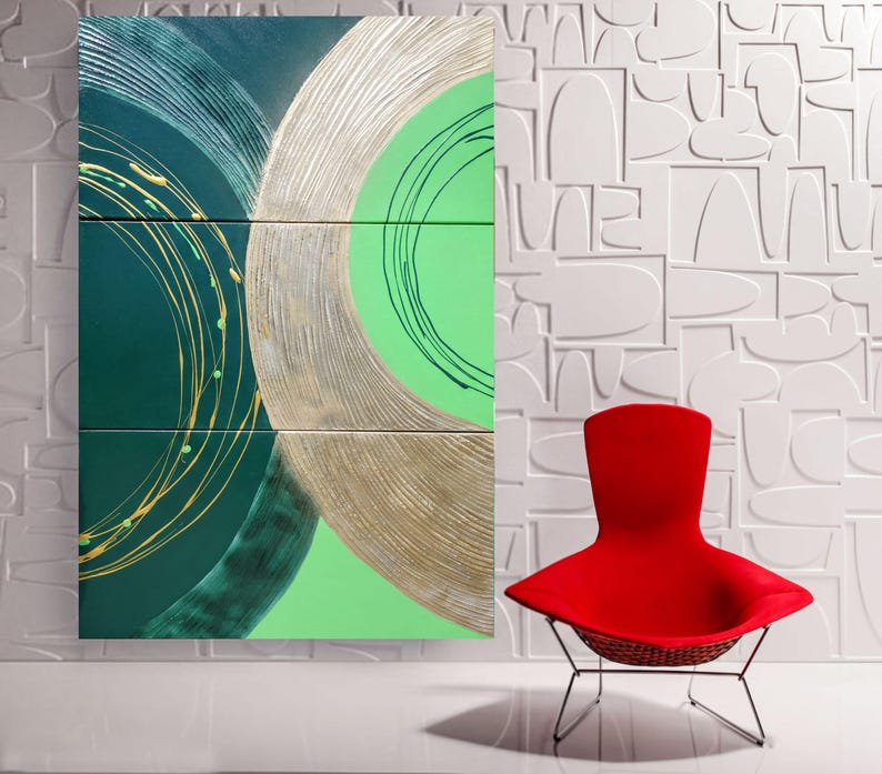 a modern, minimalist interior design with a large abstract painting on the wall and a red chair in the foreground.