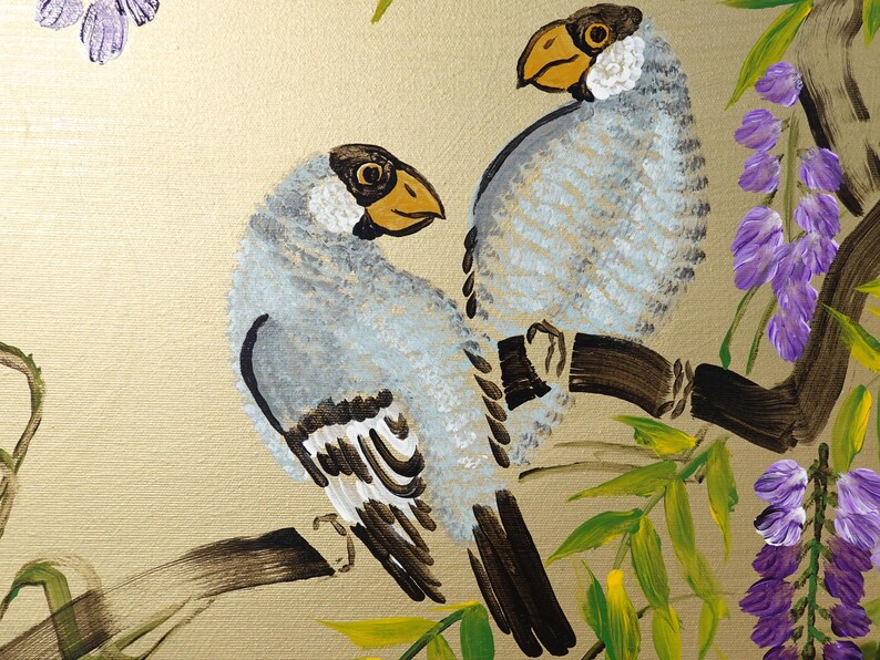 two birds perched on a branch, surrounded by purple flowers and green leaves.