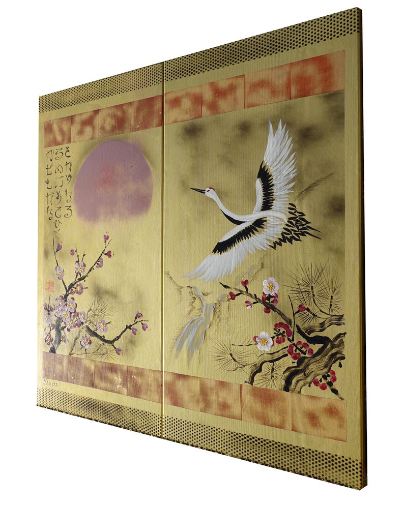 The image is a large painting featuring a crane in flight, surrounded by cherry blossoms and a sun. The painting is set against a yellow background with a decorative border.