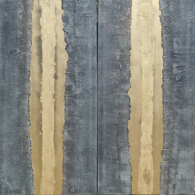 a close-up view of a textured surface with vertical lines and a metallic gold element running through the center.