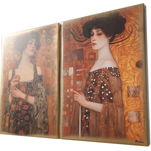 The image is a framed artwork featuring two paintings of women in elegant dresses. The paintings are set against a golden background with intricate patterns and designs.