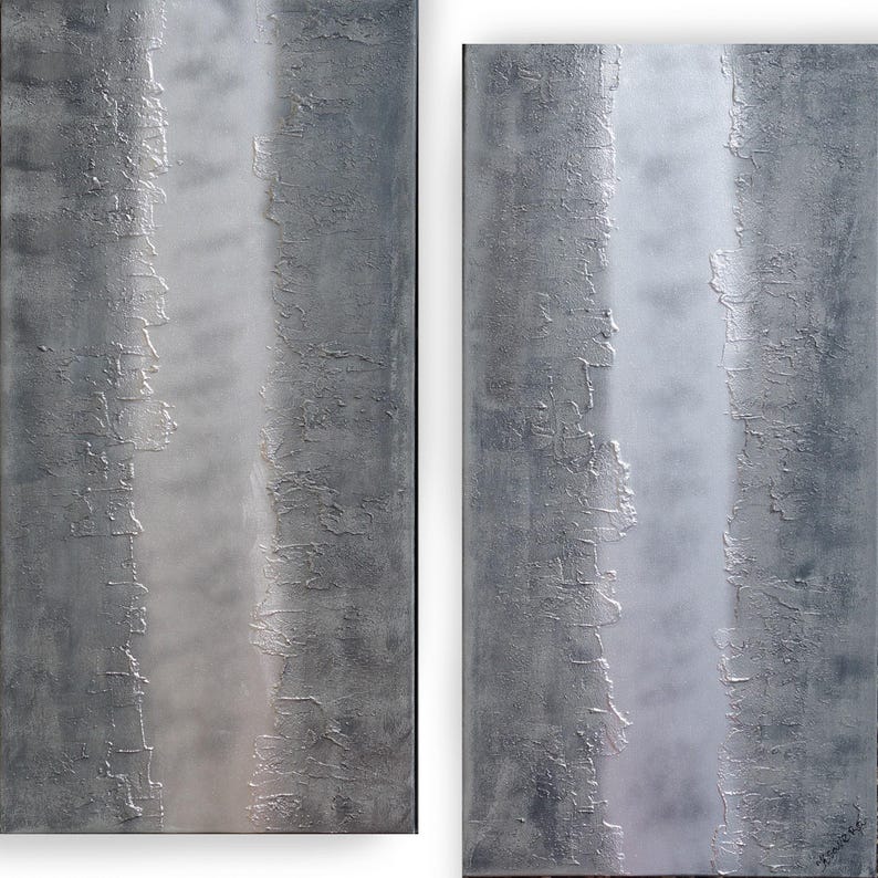 two abstract paintings with a textured, metallic appearance. The paintings are vertically oriented, with a vertical line running through them, creating a sense of depth and movement.