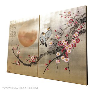 The image is a large, two-panel artwork featuring a golden background with a large, round, glowing moon and a branch with pink and white flowers. The artwork is a traditional Japanese style, with intricate details and a sense of depth and dimension.