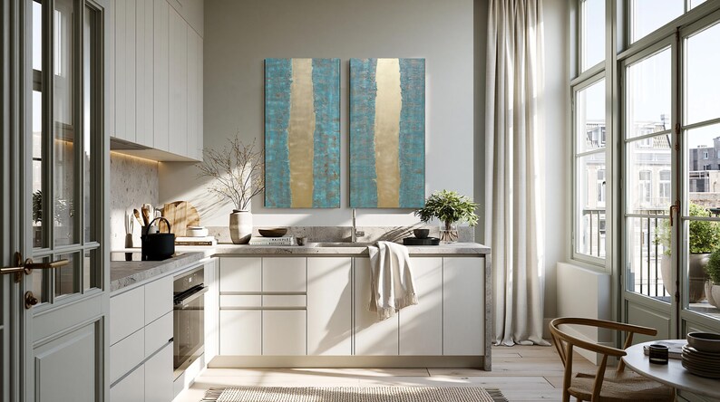 a modern, well-lit kitchen with white cabinets, a large window, and a striking abstract painting on the wall.