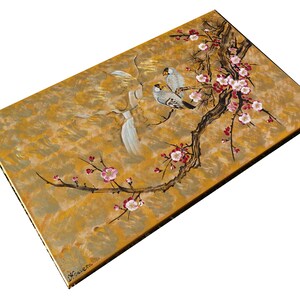 The image is a painting depicting two birds perched on a branch with pink flowers.