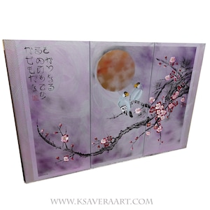 May include: A three-panel painting depicting a Japanese-inspired scene with two birds perched on a blossoming plum branch. The background is a soft purple with a large, orange moon. The painting includes Japanese calligraphy that reads "と き の か ぎ り で せ か い が き れ い で あ る"