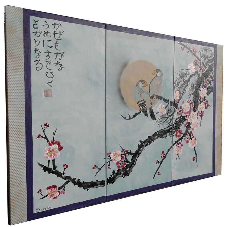 The image is a three-panel Japanese-style artwork featuring a pair of birds perched on a branch with flowers. The panels are arranged in a vertical format, with the top and bottom panels showing the birds and the middle panel depicting the branch with flowers. The artwork is framed by a purple border, and there is Japanese text written in the top left corner.