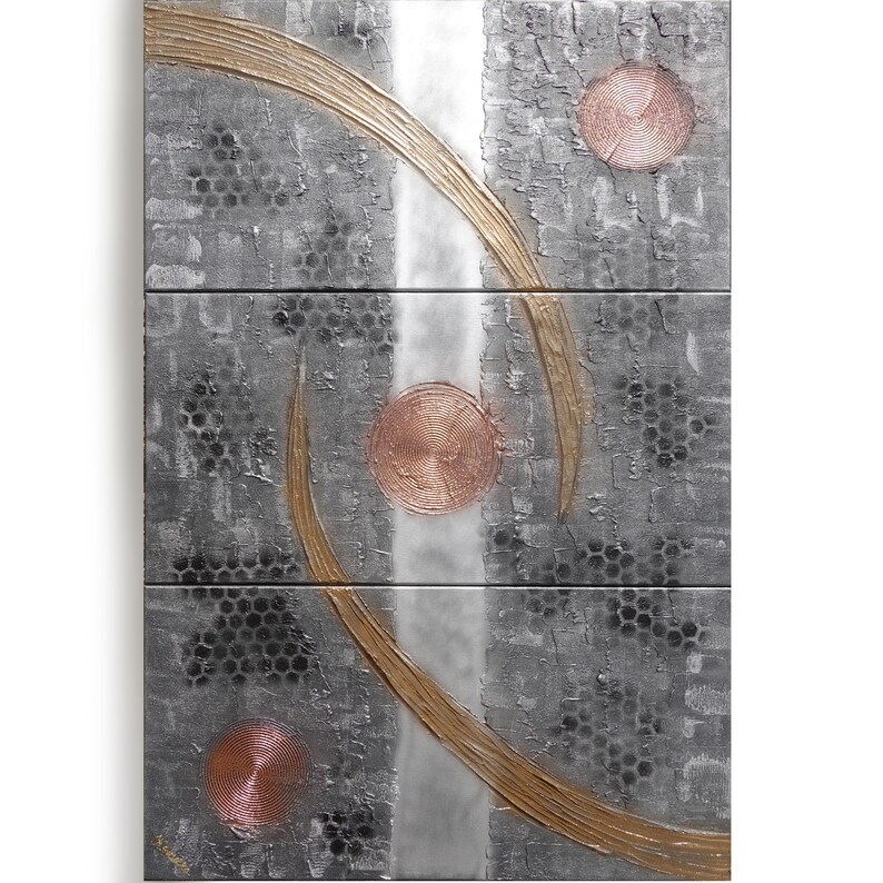 The image is a modern art piece featuring a metallic texture with a metallic sheen, and it includes three circular shapes with a metallic sheen and a metallic texture.