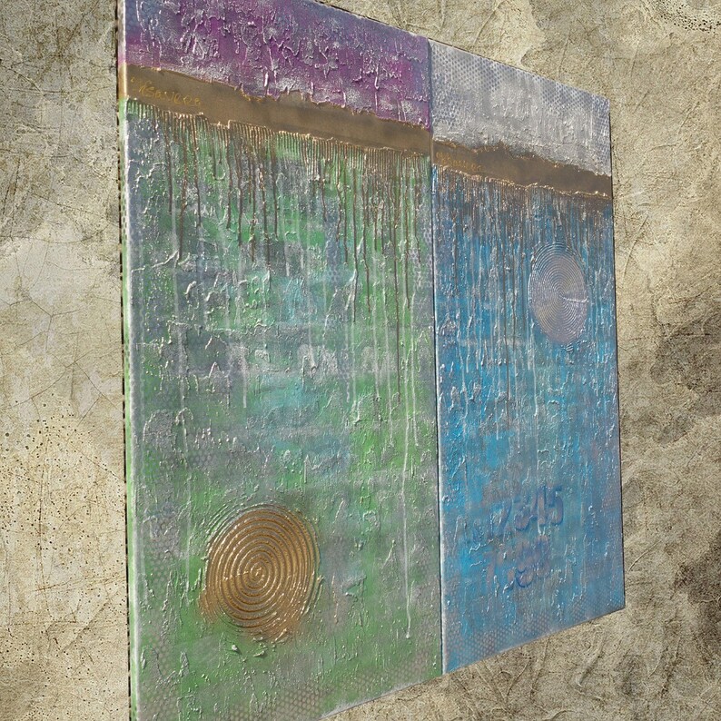 two abstract paintings with vibrant colors and unique textures, displayed on a textured wall.