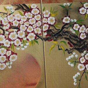 The image is a vibrant and detailed painting of a branch with white and red flowers, along with green leaves. The painting is divided into two sections, with the left side featuring a large cluster of flowers and the right side showcasing a smaller cluster of flowers. The overall composition and color palette create a visually appealing and harmonious artwork.