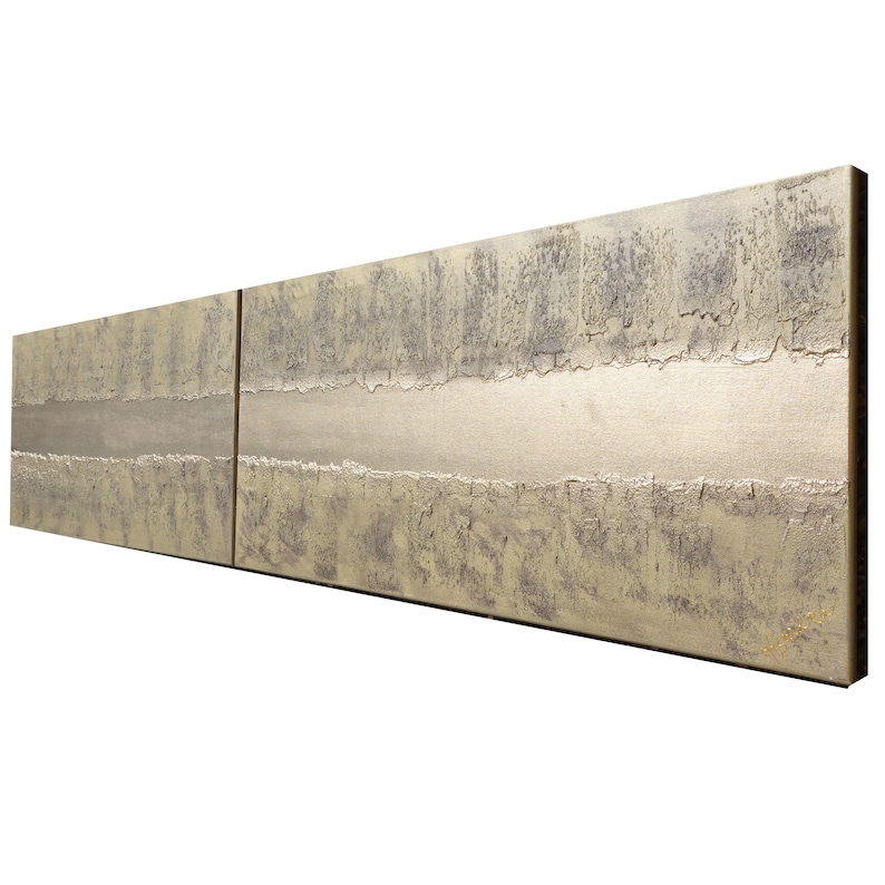 The image is a long, rectangular artwork with a textured, metallic surface. The artwork is composed of two distinct panels, each with a unique design and pattern. The overall composition creates a sense of depth and dimension, with the two panels placed side by side to create a continuous, flowing line across the image.