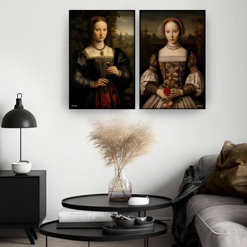 two paintings of women in period dresses, hanging on a wall above a black coffee table with decorative items.