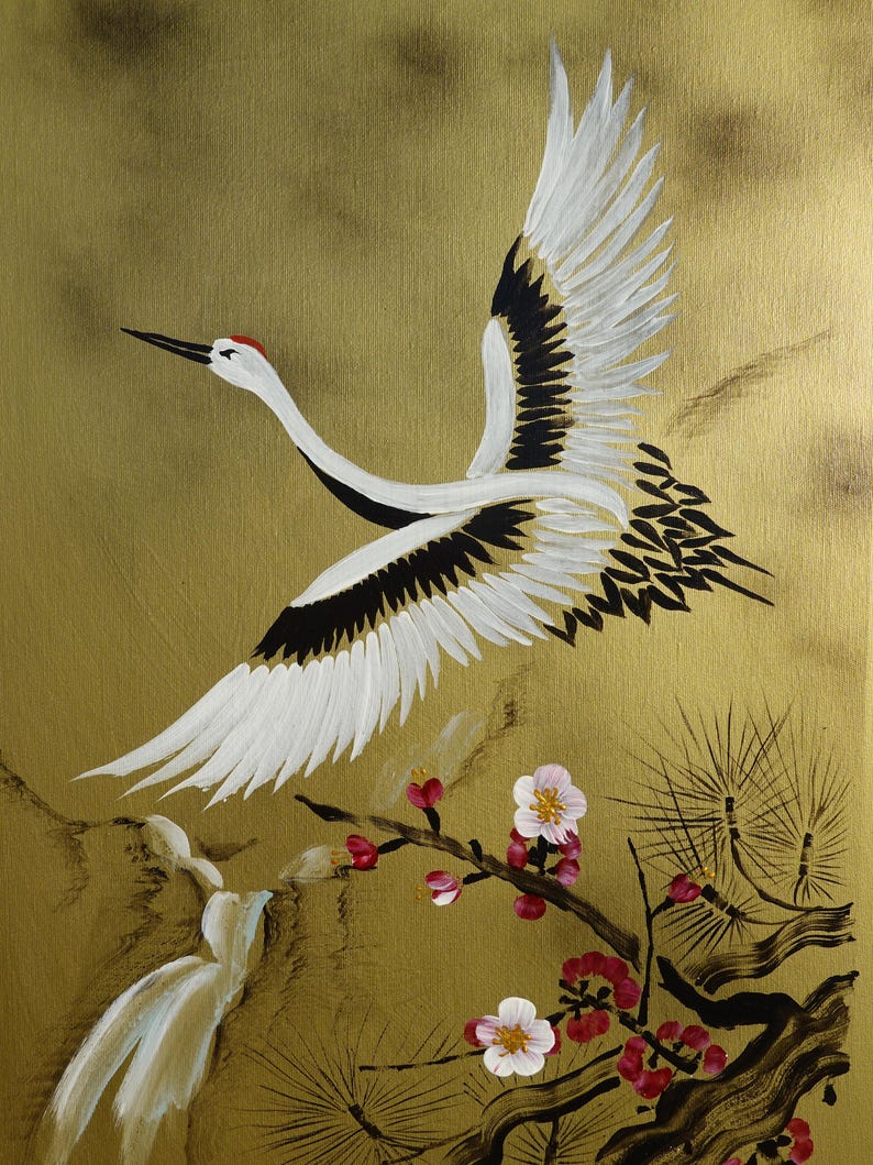 A white crane with outstretched wings is depicted in flight, surrounded by pink flowers and branches with green leaves.