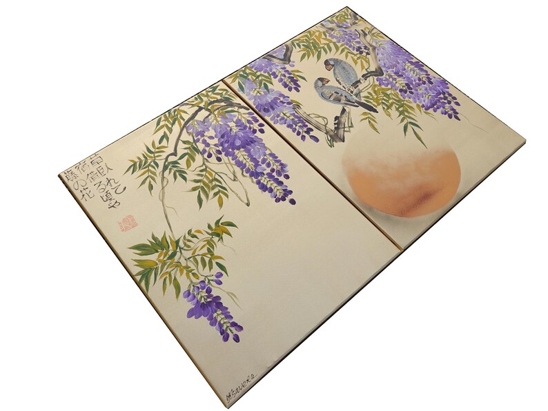 The image is a two-panel print featuring a floral design with purple flowers and birds. The panels are arranged diagonally, with the top panel showing a larger floral design and the bottom panel depicting a smaller bird. The overall composition is visually appealing and showcases the artistic talent of the creator.