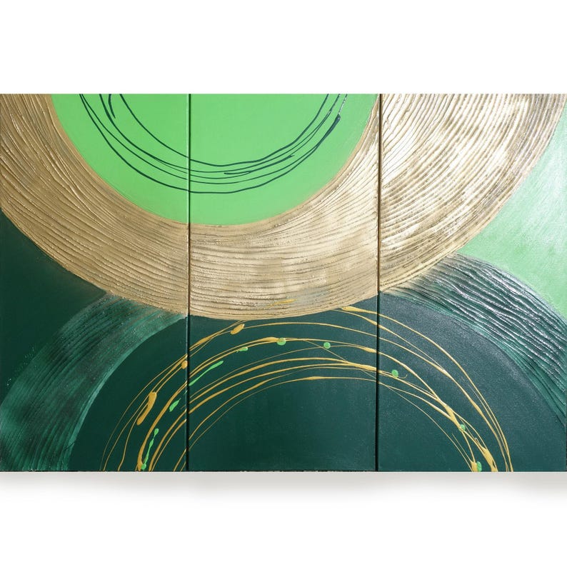 The image is a triptych of abstract paintings, featuring a combination of green and gold colors. The paintings are arranged in a grid format, with each panel showcasing a unique design. The overall composition is visually striking and captures the viewer's attention.