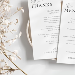 May include: A wedding menu and thank you card with a simple, elegant design. The menu features a list of appetizers, salad, entrees, and desserts. The thank you card expresses gratitude to family and friends for their support.