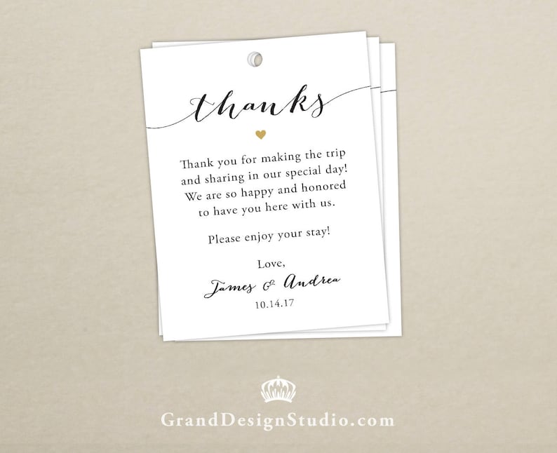 May include: White thank you card with black text that reads "thanks". The text "Thank you for making the trip and sharing in our special day! We are so happy and honored to have you here with us. Please enjoy your stay! Love, James & Andrea. 10.14.17" is printed below the word "thanks".