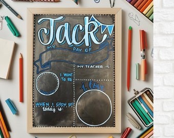 May include: A black chalkboard with a white wooden frame. The chalkboard has a blue and white design with the name "Jack" written in large letters at the top. The chalkboard also has several sections for writing, including "My Day Of", "I Want To Be", "My Teacher Is", "When I Grow Up", and "I Love".